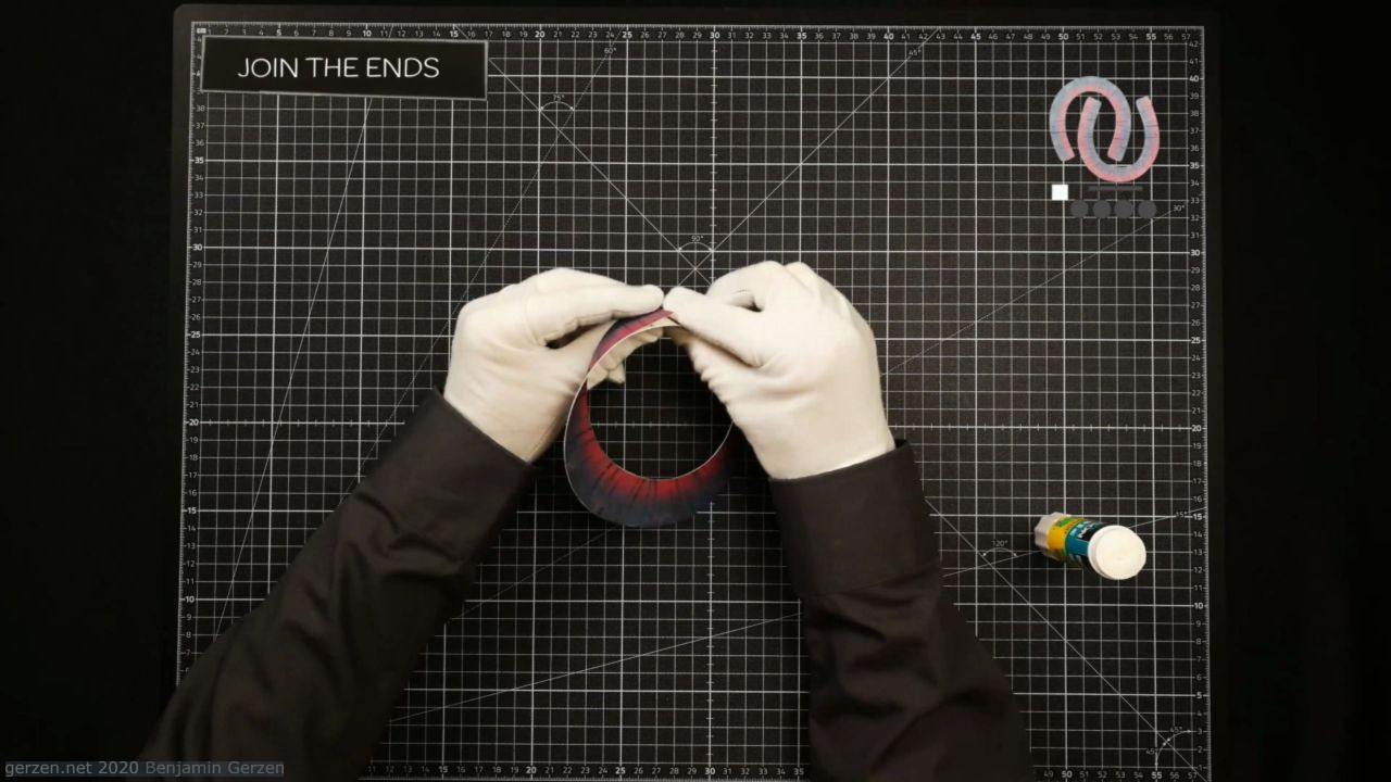 12: Press the edges of the ribbon together and wait for the glue to set.