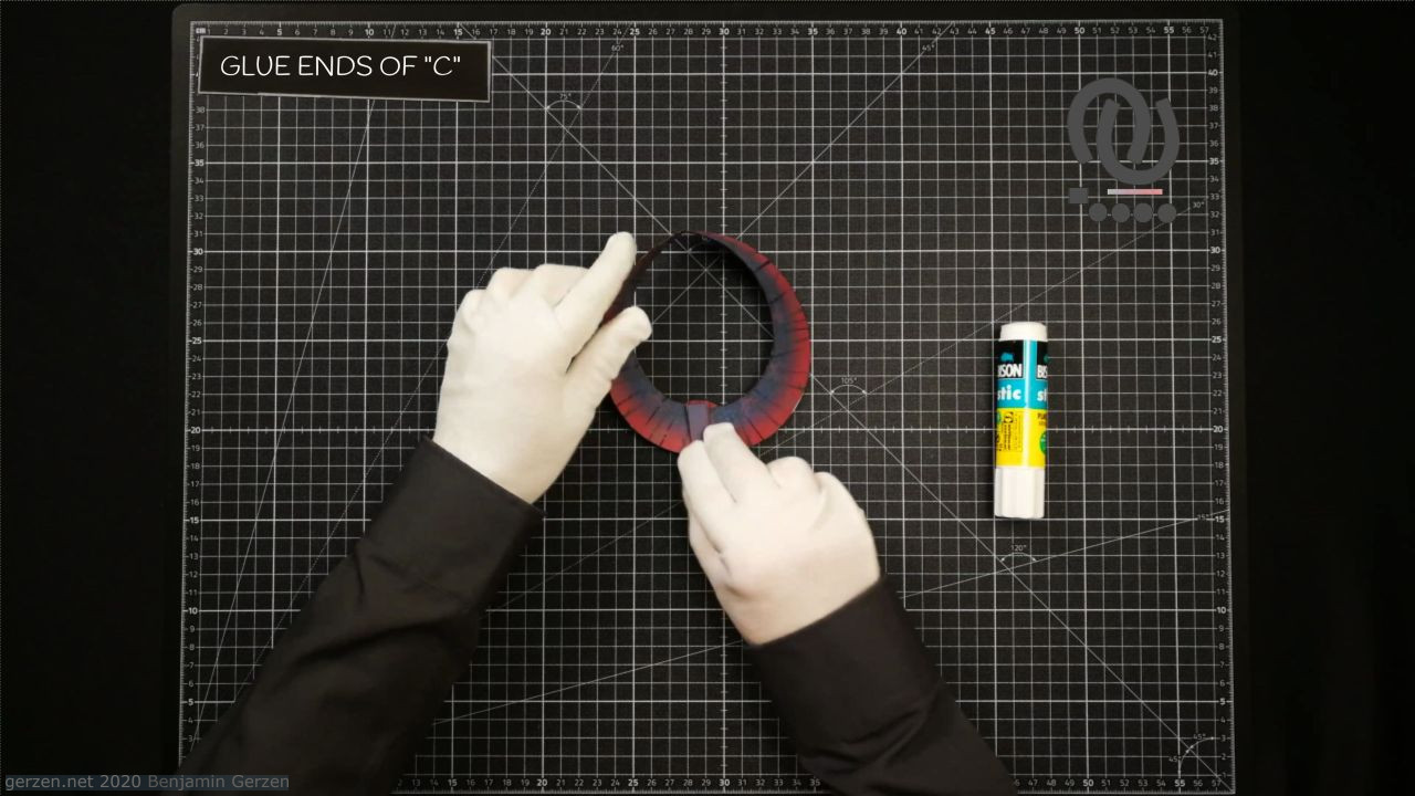 29: Glue the "C" strip into a ring around the ribbon.