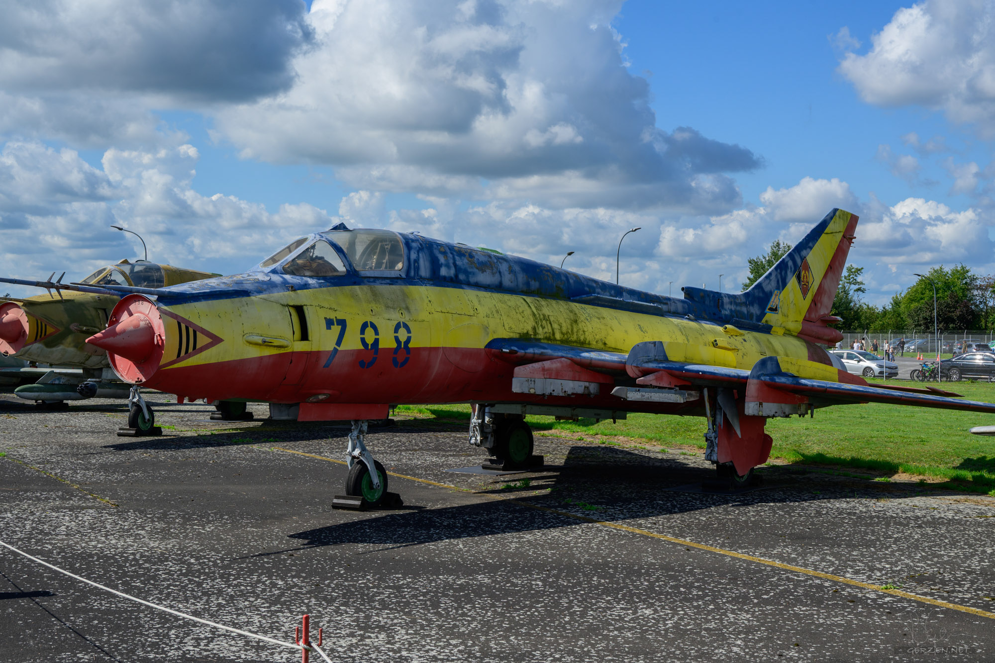 Su-22M4 - a fighter-bomber that was in service with the East German Air Force. A cheerfully colorful paint job, not typical for a military aircraft.